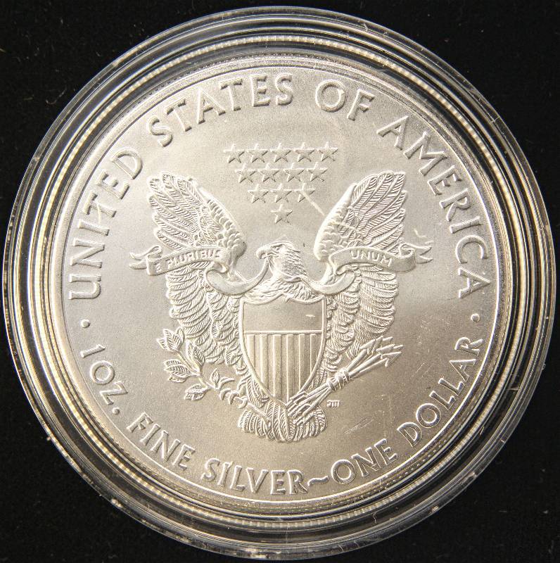 lot 95 image: 2013 AMERICAN SILVER EAGLE 1 TROY OZ. .999 FINE SILVER IN AIRTITE
