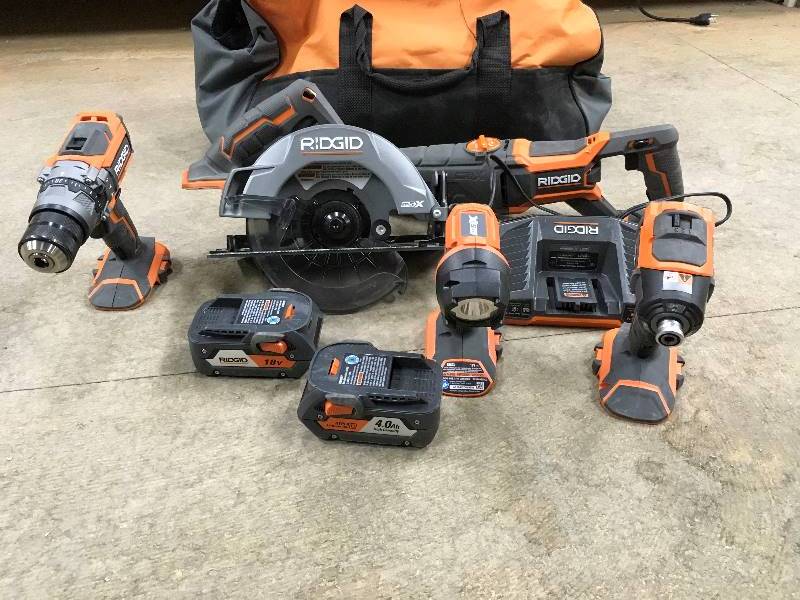Ridgid 18 Volt GEN5X Cordless Lithium-Ion Combo Kit 5-Tools with 2 4.0Ah HYPER Lithium-Ion Batteries, and Charger with Bag in working conditions