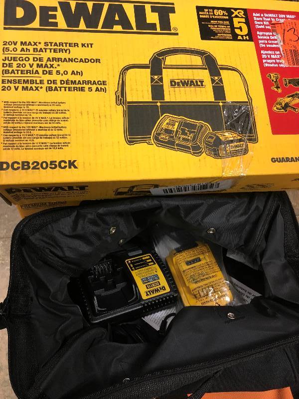 DeWalt 20 Volt MAX XR Lithium-Ion Starter Kit with Premium Battery 5.0 Ah, Charger and Kit Bag open box never used