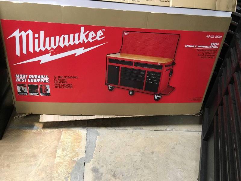 Milwaukee 60 in. 11-Drawer and 1-Door 22 in. D Mobile Workbench with Sliding Pegboard Back Wall, Red & Black not used
