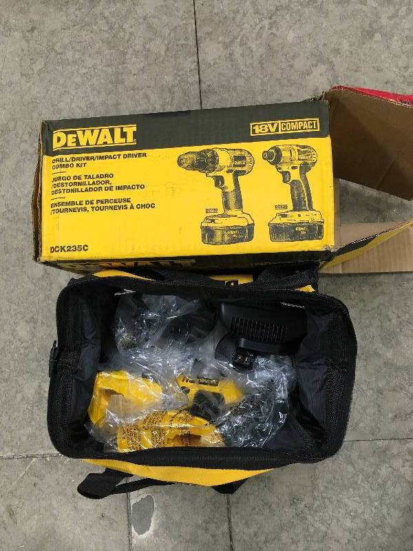 DeWalt 18 Volt NiCd Cordless DrillDriver and Impact Driver Combo Kit (2 Tools) with 2 Batteries 1.2Ah, Charger and Bag not used