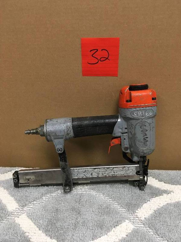 Paslode Brad Nailer in working conditions