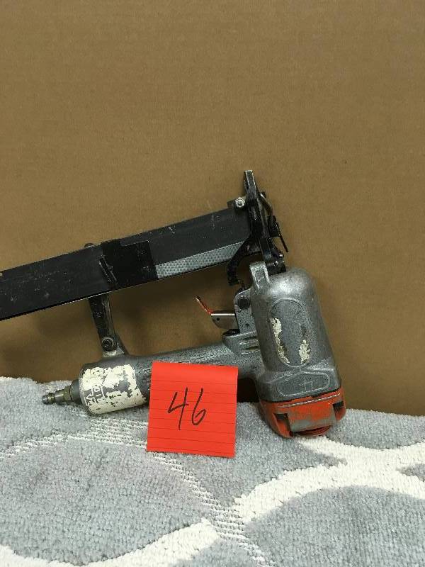 Paslode Staple Gun in working conditions