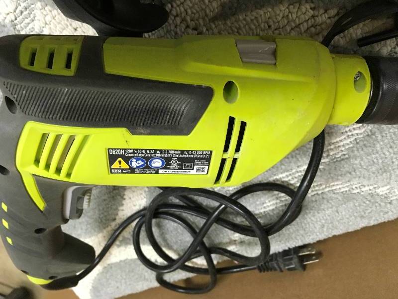 Ryobi 6.2 Amp 58 in. Variable Speed Reversible Hammer Drill in working conditions