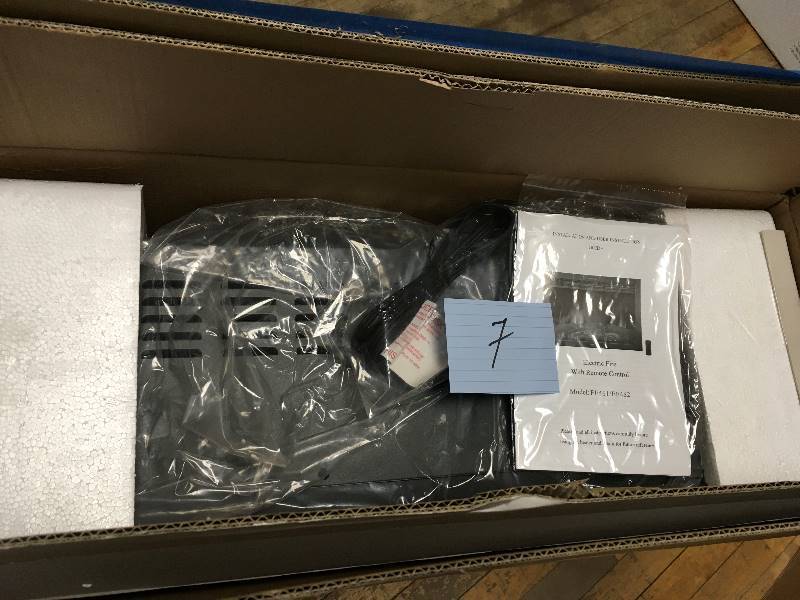 lot 7 image: AKDY FP0028 23 1500 Watt Freestanding Electric Fireplace Insert Heater with Tempered Glass and Remote Control, Black  open box not used