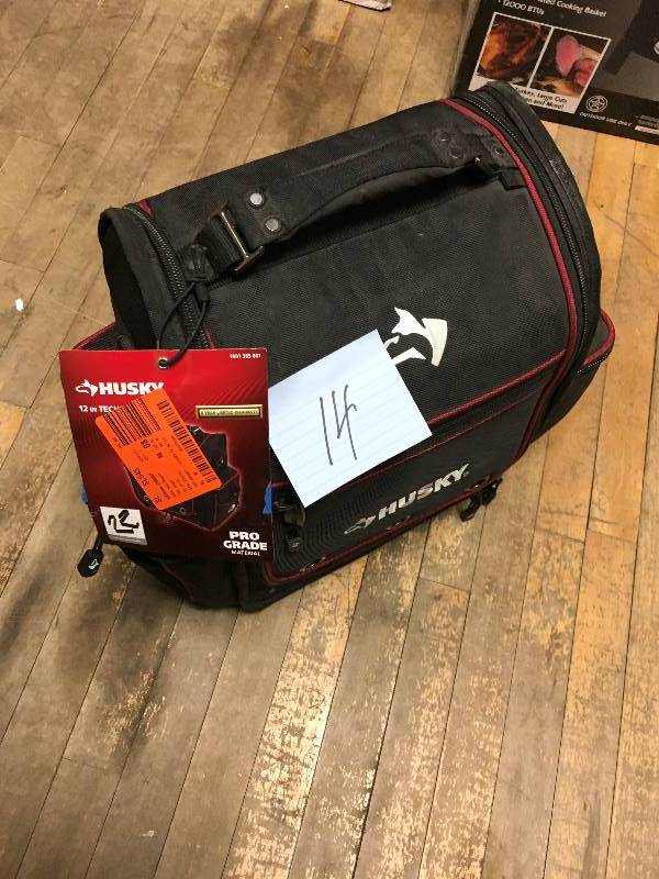 lot 14 image: Husky 12 in. Technician Bag  open box not used