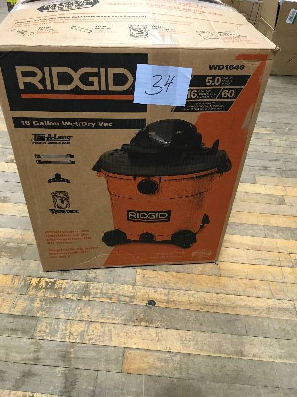 lot 34 image: Ridgid 16 Gallon 5.0 Peak HP Wet Dry Vac, OrangesPeaches open box not used