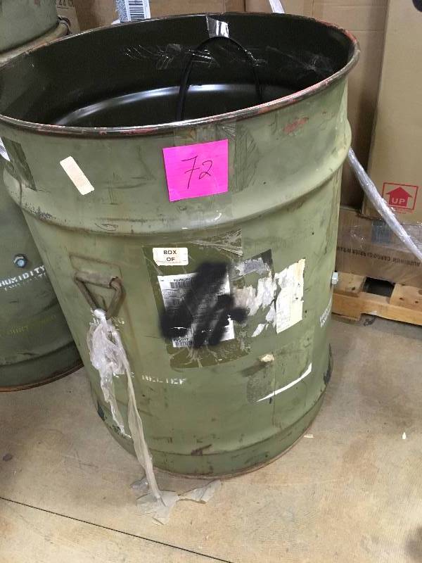 lot 72 image: US Mil 58 Gallon Drum with Valve open box not used
