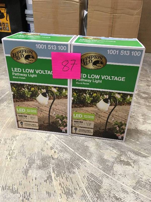 lot 87 image: Hampton Bay Low-Voltage Black Outdoor Integrated LED Black Landscape Path Light with White Tulip Shade - Lot of 2 open box not open box not used