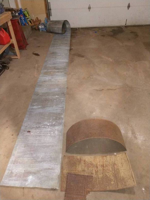 lot 2 image: Roll of Galvanized Steel, Half Moon Heavy Duty Steel Grate, and Victorian Ceiling Tin 