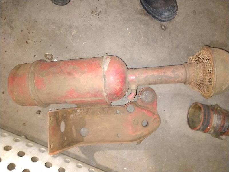 lot 4 image: Semi Truck Exhaust Cover, Two Old Truck Parts 