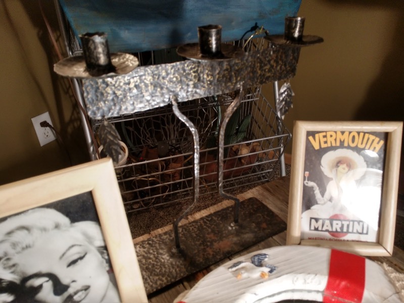 lot 36 image: Candle Holder, Marilyn Monroe Framed Photo, Vermouth Martini Framed Advertising, Floatation Device and Anchor Mirror