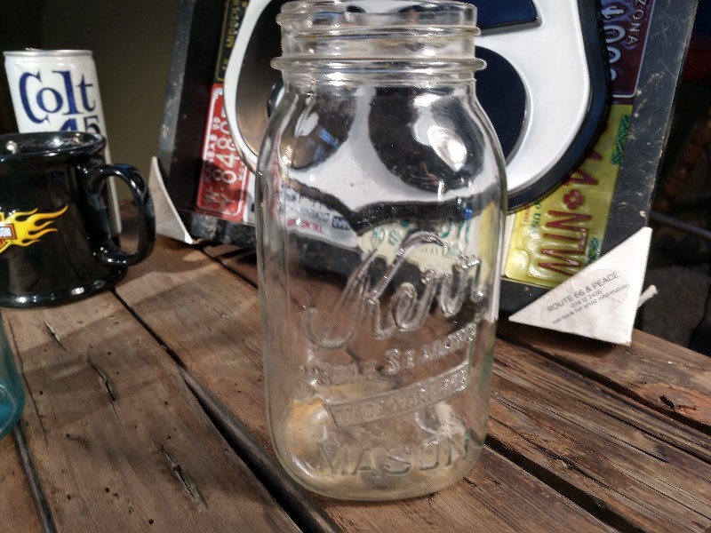 lot 127 image: Route 66 Sign, Colt 45 Can, Kerr Mason Jar, Ball Mason Jar, Blatz Beer Car, Hamms Beer Bottle, Harley Davidson Mug