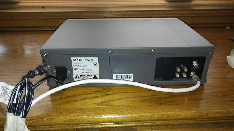 lot 119 image: Sanyo 4-Head VHS Player and Movies Included