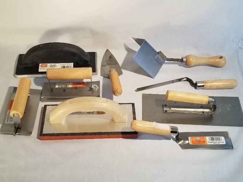 lot 20 image: CONCRETE TROWELS AND FLOATS