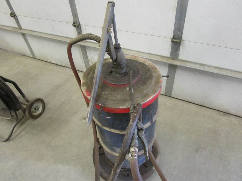 lot 65 image: Oil PumpBarrel on Rolling Platform