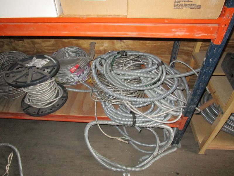 lot 11 image: 2 Sections of Pallet Racking wContents of Electrical Supply (see pics)