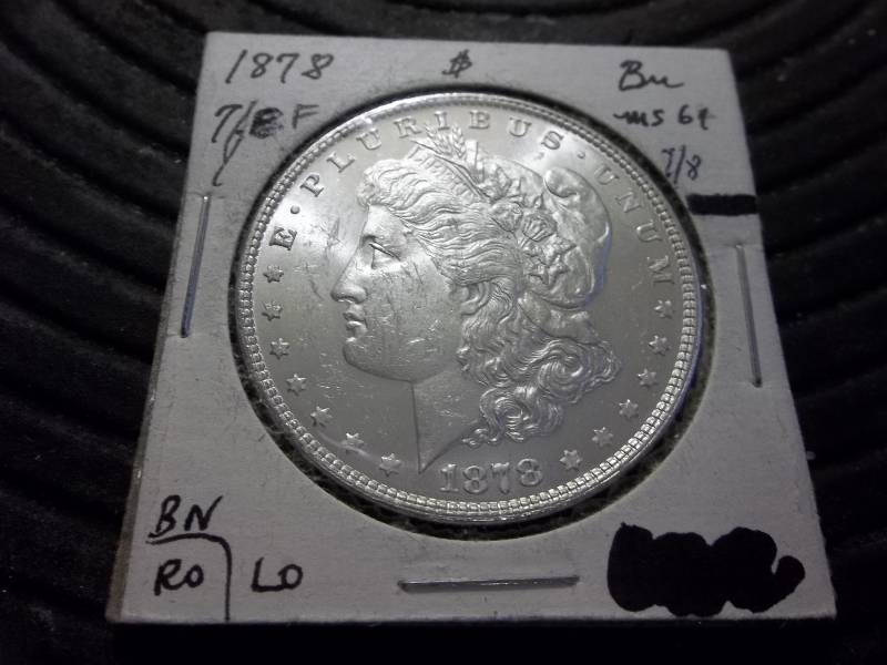 1878  Morgan Silver Dollar With 7 Over 8 Tail Feathers