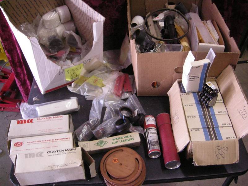 lot 131 image: Misc Small Engine Parts - Well Pump Leathers - Etc
