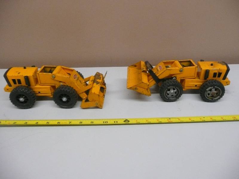 lot 29 image: 2 Vintage Tonka Front End Bucket Loaders - Orange Steel - see pictures