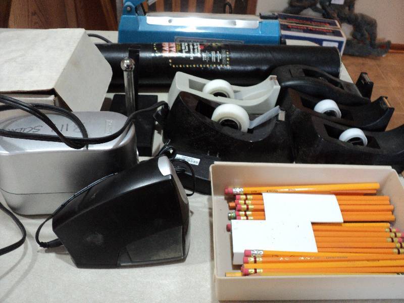 box of impulse sealer, games, tape ...