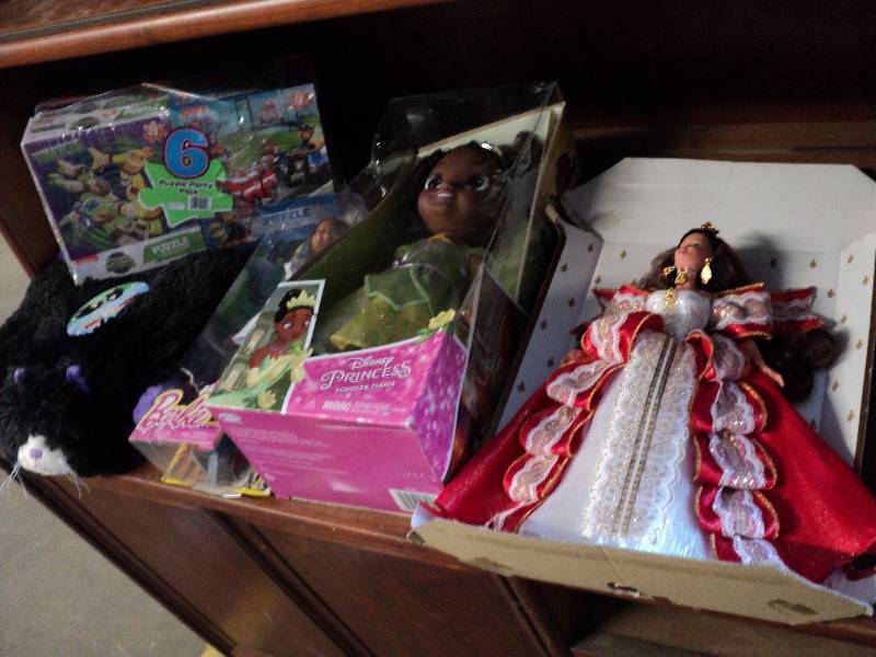 holiday Barbie, pillow pet, puzzles...