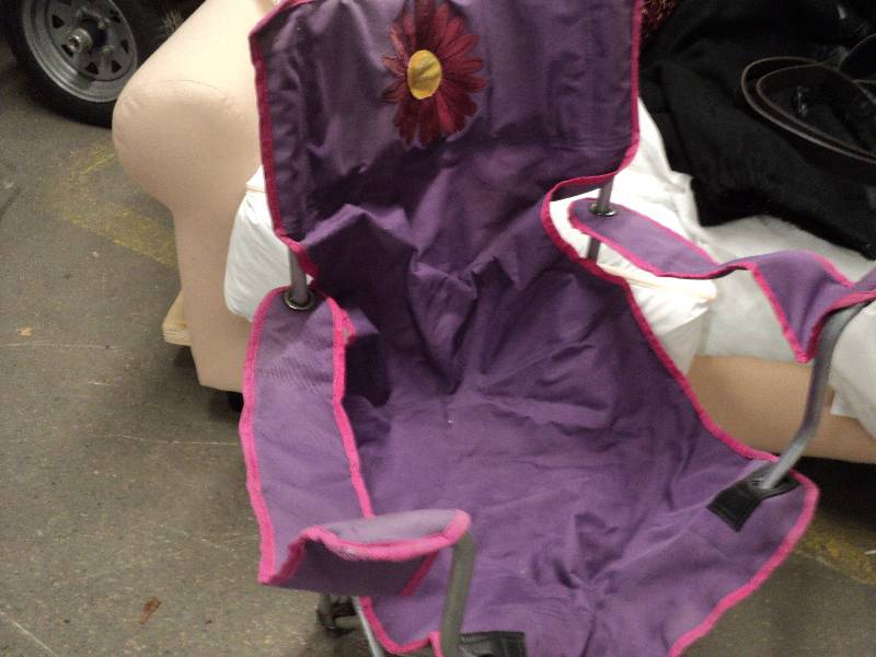 clothing, belts, and a chair...