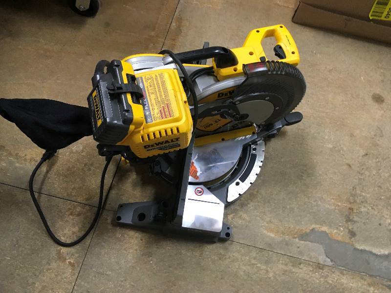 DeWalt FLEXVOLT 120 Volt MAX Lithium-Ion Cordless Brushless 12 in. Compound Miter Saw with AC Adapter used in like new condition