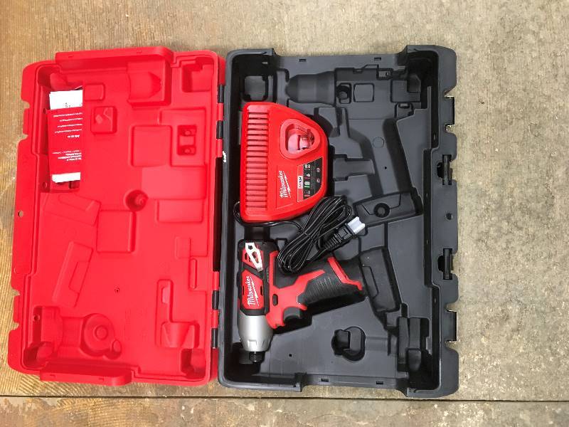 Milwaukee M12 Fuel 12 Volt Cordless 14 in. Impact  Driver Kit.  Tool and Charger Only in like new condition