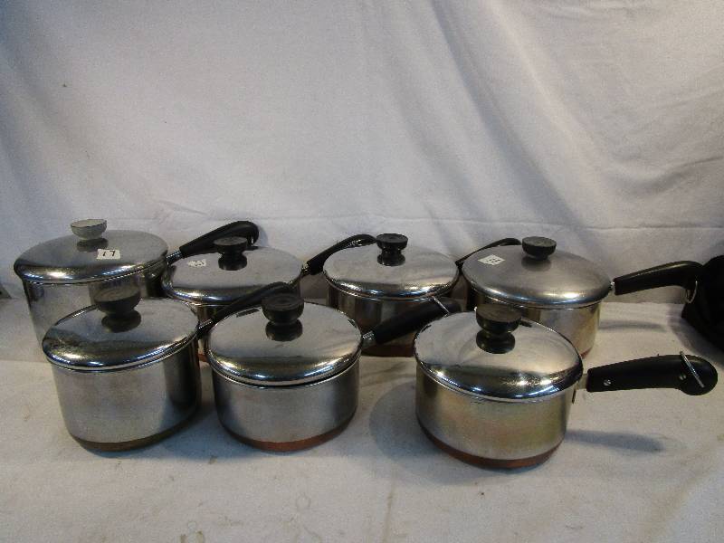 lot 36 image: Revere Ware 7 pots with Lids Stainless Steel