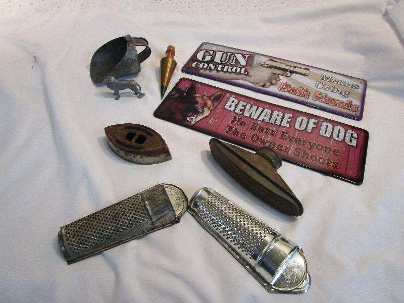 lot 53 image: Metal Signs, Mini  Graters, Mini Scoop, Mini Iron, Brass Plumb Bob end and Metal Lion