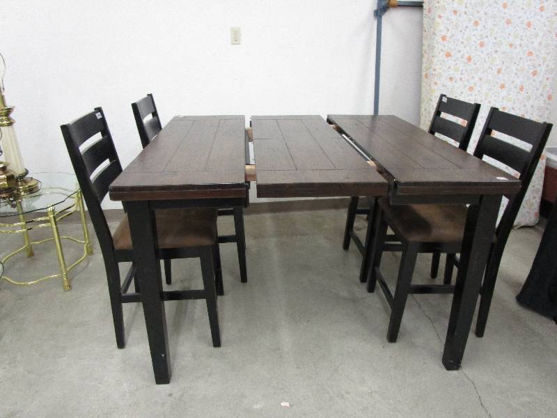 lot 93 image: High Table and 4 Chairs with  leaf that folds and hides underneath 35 12 x 54 small and 54 x 54 with leaf