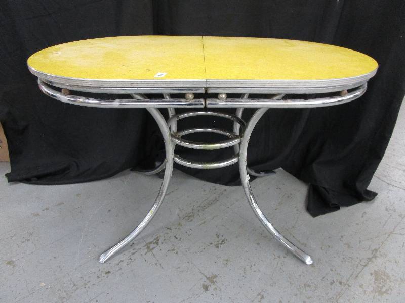 lot 146 image: Vintage Yellow top table with chrome base