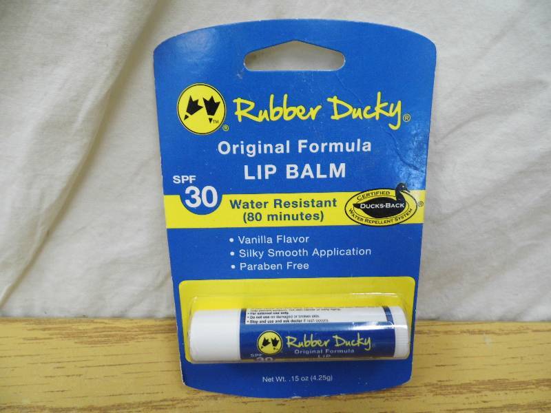 lot 128 image: Lot of 15 Rubber Ducky SPF Lip Balm