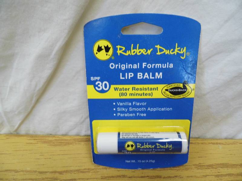lot 133 image: Lot of 15 Rubber Ducky SPF Lip Balm