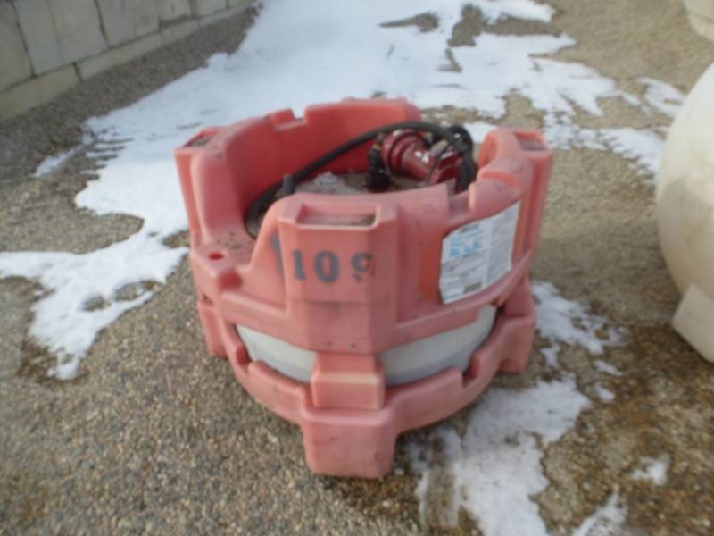 lot 110 image: Poly Tank with Pump