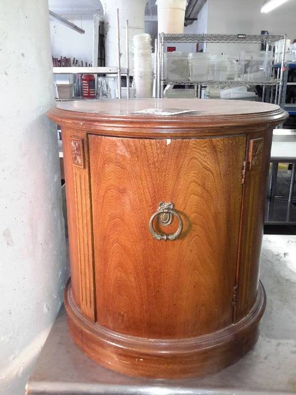 lot 74 image: Nice solid wood round end table with opening cabinet