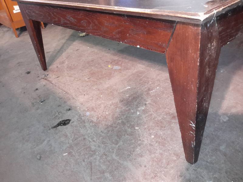 lot 68 image: Solid wood coffee table.. Interesting triangular wood design in top