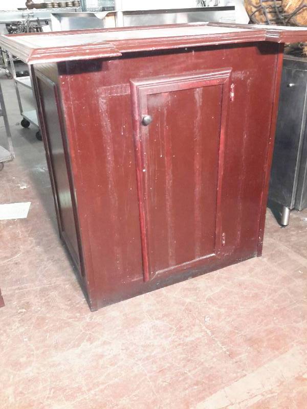 lot 17 image: Wood countertop Cabinet with bottom cabinet
