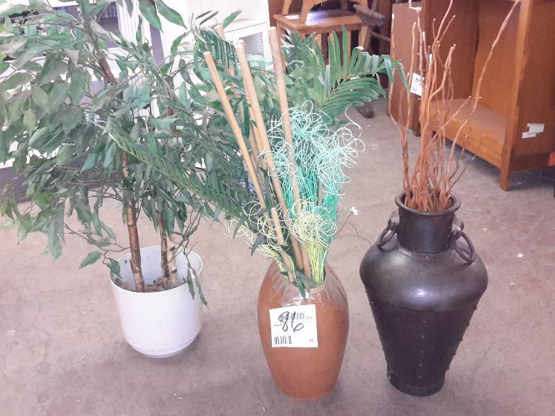 lot 86 image: 3 artificial plants and nice heavy urns.. Crockery