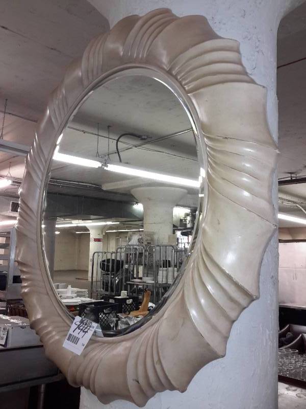 lot 144 image: Large Tufted Edged Mirror.