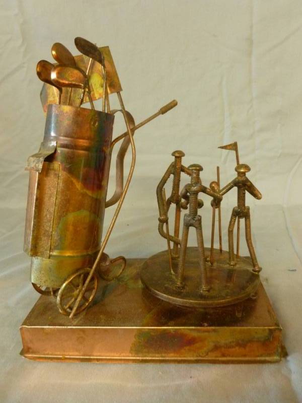 lot 69 image: Cut Metal Music Player