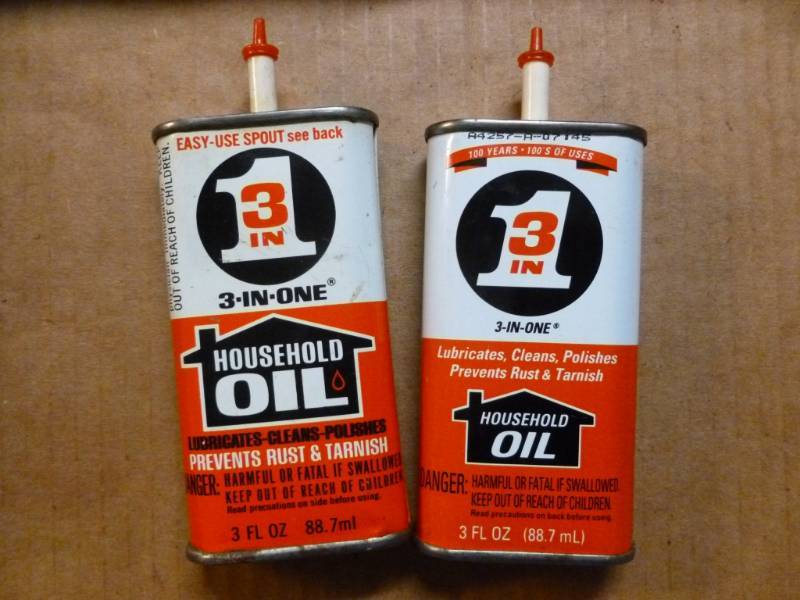 lot 77 image: Metal Oil Cans