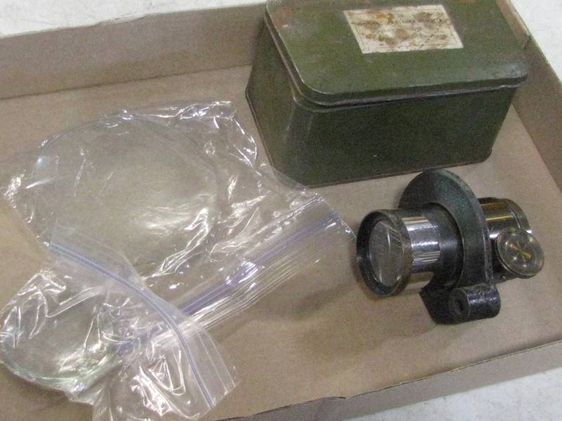 lot 15 image: Magnifying Lenses and tin Container