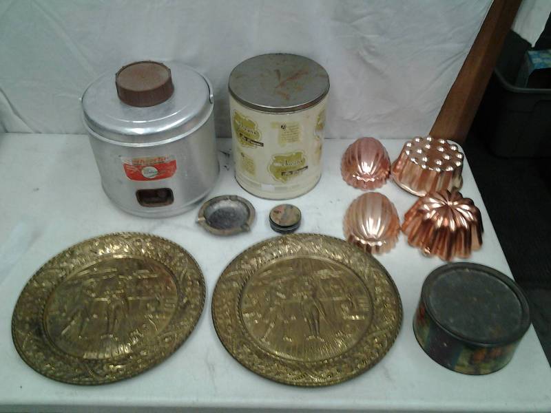 lot 44 image: Vintage Victorian Brass Wall Decor, Aluminum Dispenser, Copper Molds, Misc. Tins