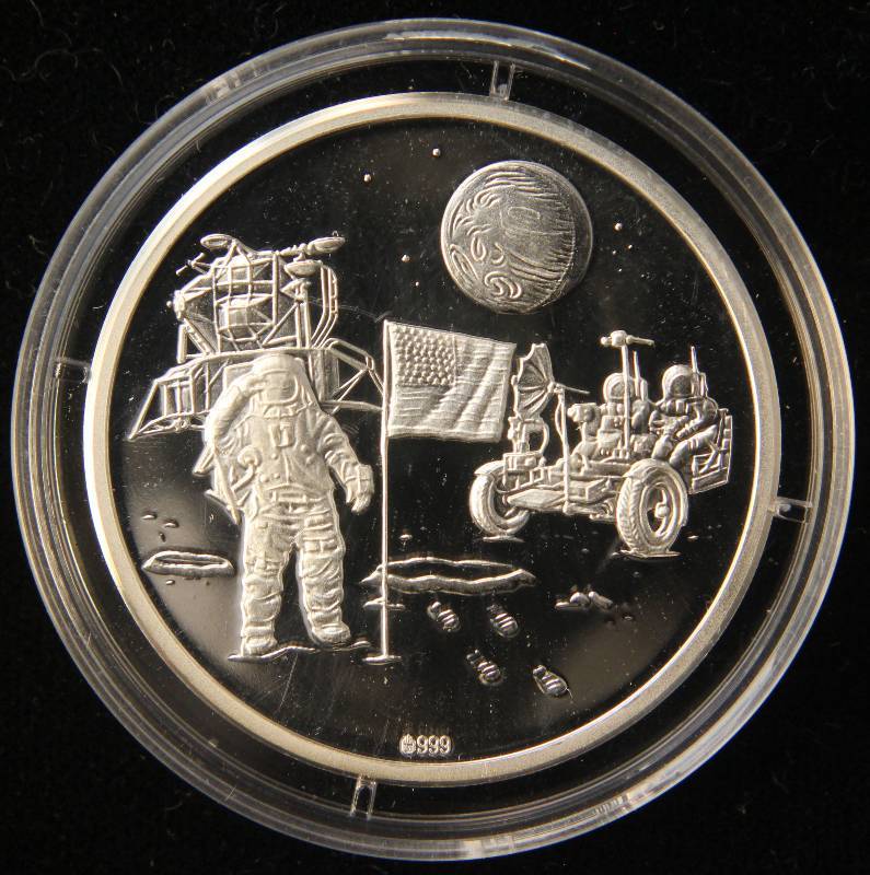 lot 19 image: 13 TROY OZ. .999 FINE SILVER NEIL ARMSTRONG SILVER ROUND IN AIRTITE