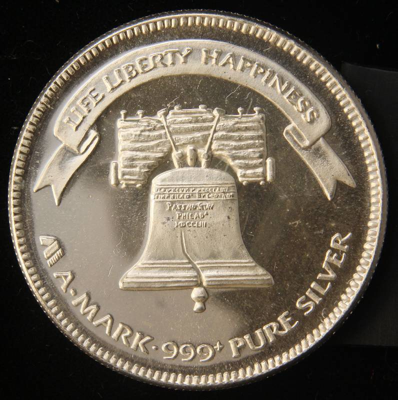 lot 24 image: 1 TROY OZ. .999 FINE SILVER 1983 A-MARK LIBERTY ROUND