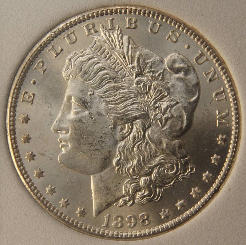 lot 27 image: 1898-O MORGAN SILVER DOLLAR MS66 NCGS