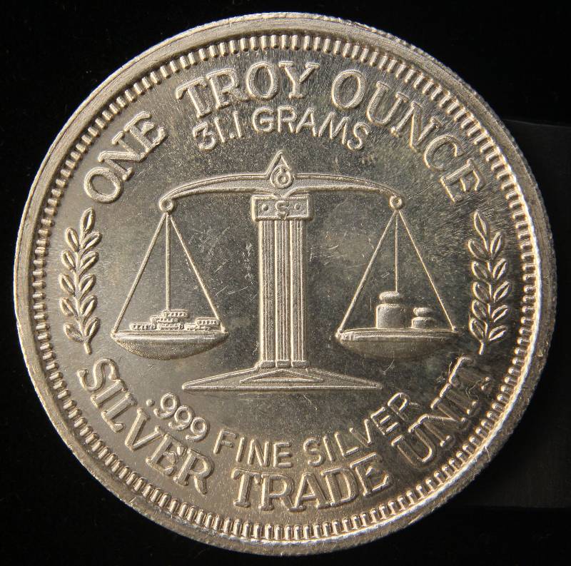 lot 32 image: 1 TROY OZ. .999 FINE SILVER MORGAN DOLLAR DESIGN TRADE UNIT
