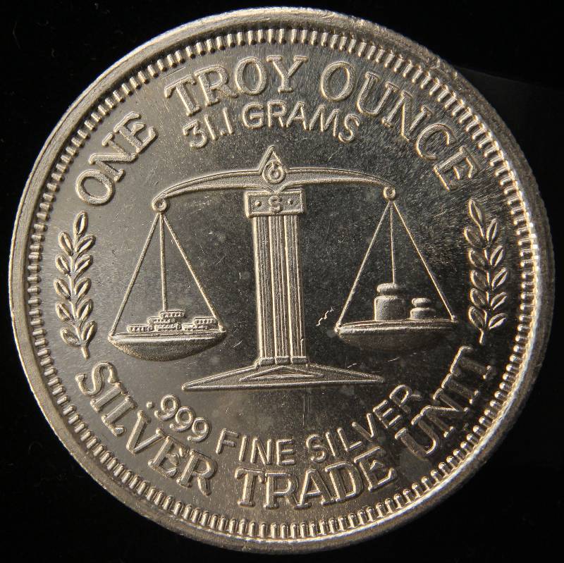 lot 49 image: 1 TROY OZ. .999 FINE SILVER MORGAN DOLLAR DESIGN TRADE UNIT